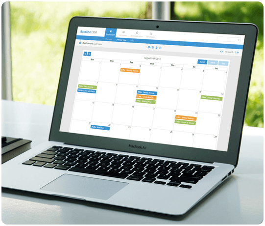 Custom module in Baseline CRM displayed on a laptop